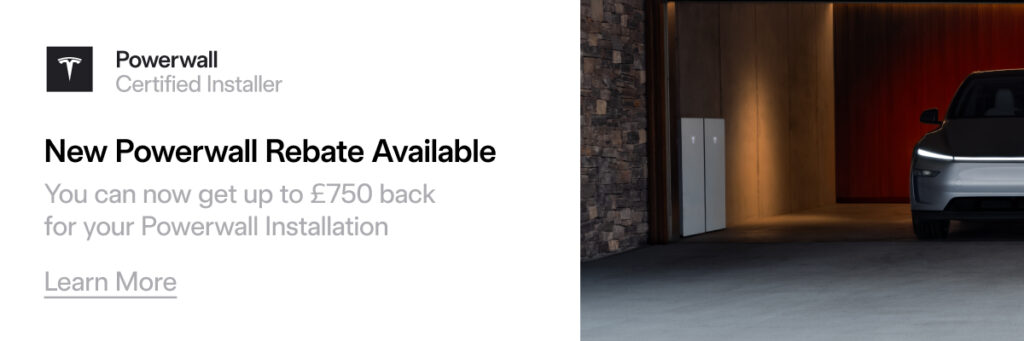 an image of a Tesla car in a garage with 2 Tesla Powerwall batteries on the wall.